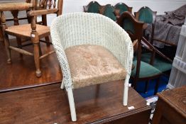A vintage Lloyd Loom child's tub chair