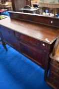 An early mahogany sideboard having ledge back