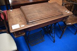 A traditional treadle sewing machine, Singer