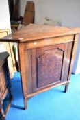 A 19th Century oak corner cupboard base