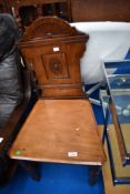 A 19th Century mahogany hall chair (af)