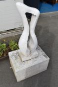 A modern garden ornament of stylised form