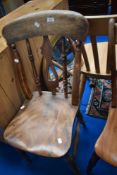 A 19TH Century solid seat kitchen chair