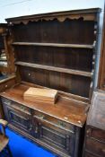 An early 20th Century oak dresser, approx dimensions. W138 D50 H186cm (overall)