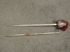 A Scottish basket hilt sword, 1828 pattern, dome pommel with a ball finial, basket hilt with heart