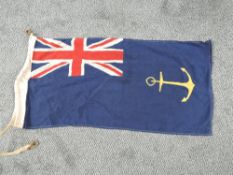 A Royal Navy Flag, blue withy union jack and anchor, Government Service Ensign, most commonly seen