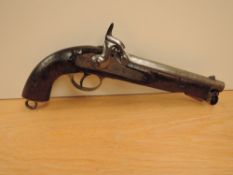 An East India Government Percussion Pistol having plain wooden grip, Birmingham 1870 and Crown