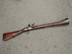 A 18th century Flintlock Blunderbuss having steel barrel, lock plate stamped FARMER & numbered 1?43,