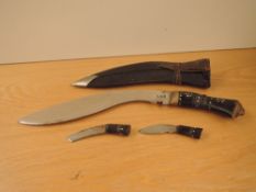 A Kukri Knife marked I C E and INDIA made with dots, blade length 27cm, overall length 39cm with