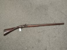 A 18th/19th century Flintlock Rifle (af), having brass plaque numbered 1786 and named to The Rev '