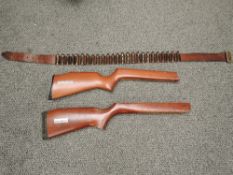 Two wooden Gun Stocks, BSA Meteor and Gamo/El Gamo along with a leather cartridge belt