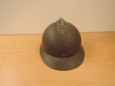 A French Military Helmet, WWI period possibly used in WWII, no marks seen, leather liner, missing