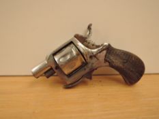 A vintage 8 shot starting pistol with foldaway trigger, patent numbers to one side, Pat 62??? & 2624