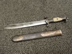 A German WWII RAD Officers Dagger made by Alcoso Solingen, bakelite and metal grip, blade