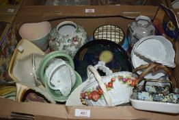 A carton of assorted baskets and vases including Leighton Pottery, Wedgwood and HJ Wood Ltd etc.