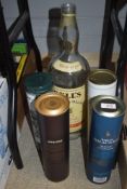 A Empty bottle of Bell's Old Scotch Whisky, 4.5 Litre along with three empty Whisky Tubes,