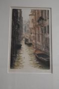 After Ugo Baracco (b.1949, Italian), coloured lithograph, A Venetian canal scene, signed in pencil