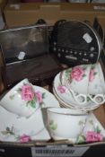 A Bakelite cigarette box with hinged lid, a Royal Stafford part tea service having pink rose pattern