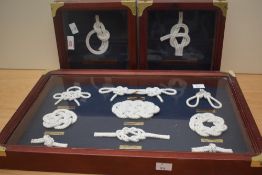 Three cased displays of nautical knots, the largest measures 32cm x 48cm