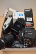 A collection of camera equipment, Minolta 28/2.8 MD lens, Vivitar flash, vintage Kodak camera etc.