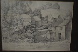 A framed sketch of a countryside village signed Neil Taylor measuring 42cm x 51cm