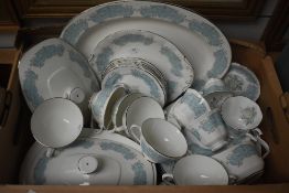 A Royal Imperial part dinner/ tea service having blue scroll design and silver gilt edging with a