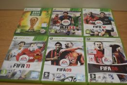 Six Xbox 360 games including Fifa 08, 09,11, 12 and 13 as well as the 2014 Fifa World Cup Brazil