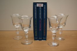 Four weighty Dartington style desert wine glasses having bell top and knop stem sold alongside a