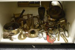 A selection of assorted brass and copperware, to include a trumpet, horse brasses, copper shot