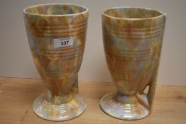 A pair of Irish Carrig pottery vases, of mid-century design with mottled and moulded decoration,