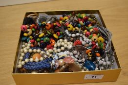 An assortment of costume jewellery including beaded necklaces, statement pieces and shell examples