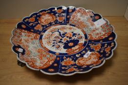 A 19th Century Japanese Imari charger of scalloped outline, measuring 46cm in diameter