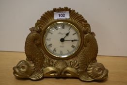 A reproduction History Craft battery operated mantel clock, in the Victorian style with gilt resin