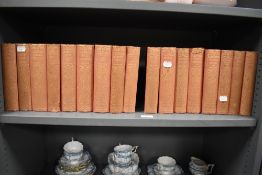 A selection of cloth bound Charles Dickens novels, comprising twenty one editions including 'Bleak