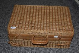 A vintage wicker picnic basket, measuring 19cm x 30cm x 46cm overall