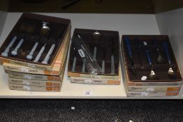 Eleven boxes of Denby stoneware handled cutlery in the Regency pattern