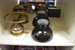 A pair of 19th Century brass mounted light fittings, converted from oil lamps, and including two