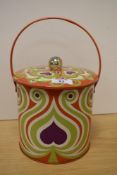 A 1970s psychedelic and retro biscuit tin, measuring 30cm high