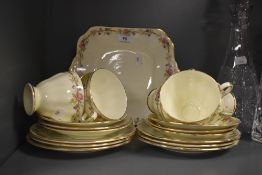 An early 20th Century Jackson & Gosling Grosvenor porcelain tea set, decorated with bands of