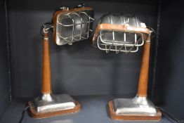 A pair of attractive mid-20th Century chrome and leather desk lamps, each measuring 42cm high