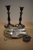 A pair of Edwardian style plated candlesticks engraved 'JEC' to base within a lorrel reef, sold