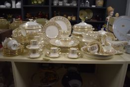 A quantity of Wedgwood china tableware, in the 'Gold Florentine' pattern, and including lidded