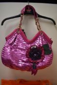 An original by Sharif 1827 pink sequin shoulder bag with floral motif, sold with dust cover.