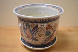 A 20th Century Chinese porcelain jardiniere and tray, decorated in a mosaic design with exotic birds