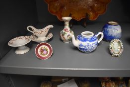 A Chinese blue and white Rice Grain pattern tea bowl, measuring 5.5cm high, and a selection of other