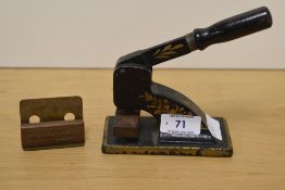 A Victorian cast iron desk letter head seal, measuring 14cm high