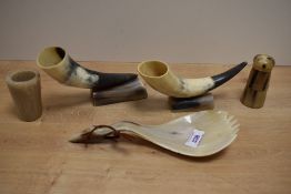 A selection of horn items, two mounted horn vases, an ornamental spork and a salt cellar