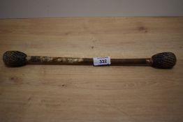 A coiled wire spring and woven wire Royal Navy baleen/cosh