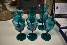 A selection of early 19th Century deep green coloured glasses, the largest measures 14cm high