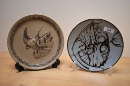 A Poole Pottery Aegean pattern plate, decorated with a stylised angel fish, and sold together with a